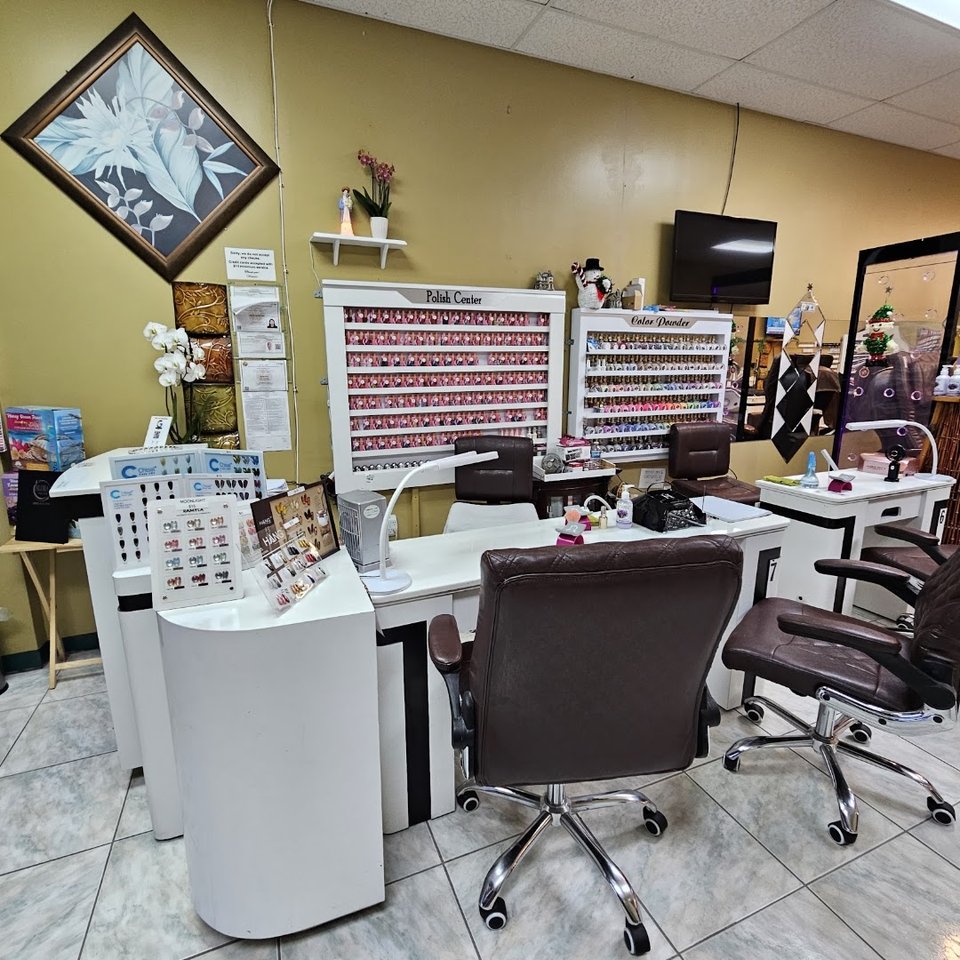 Bright salon interior with manicure and pedicure areas.